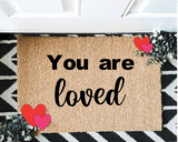 You are loved outdoor mat