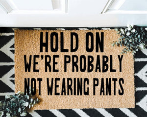 Hold On We're Probably Not Wearing Pants Outdoor Mat